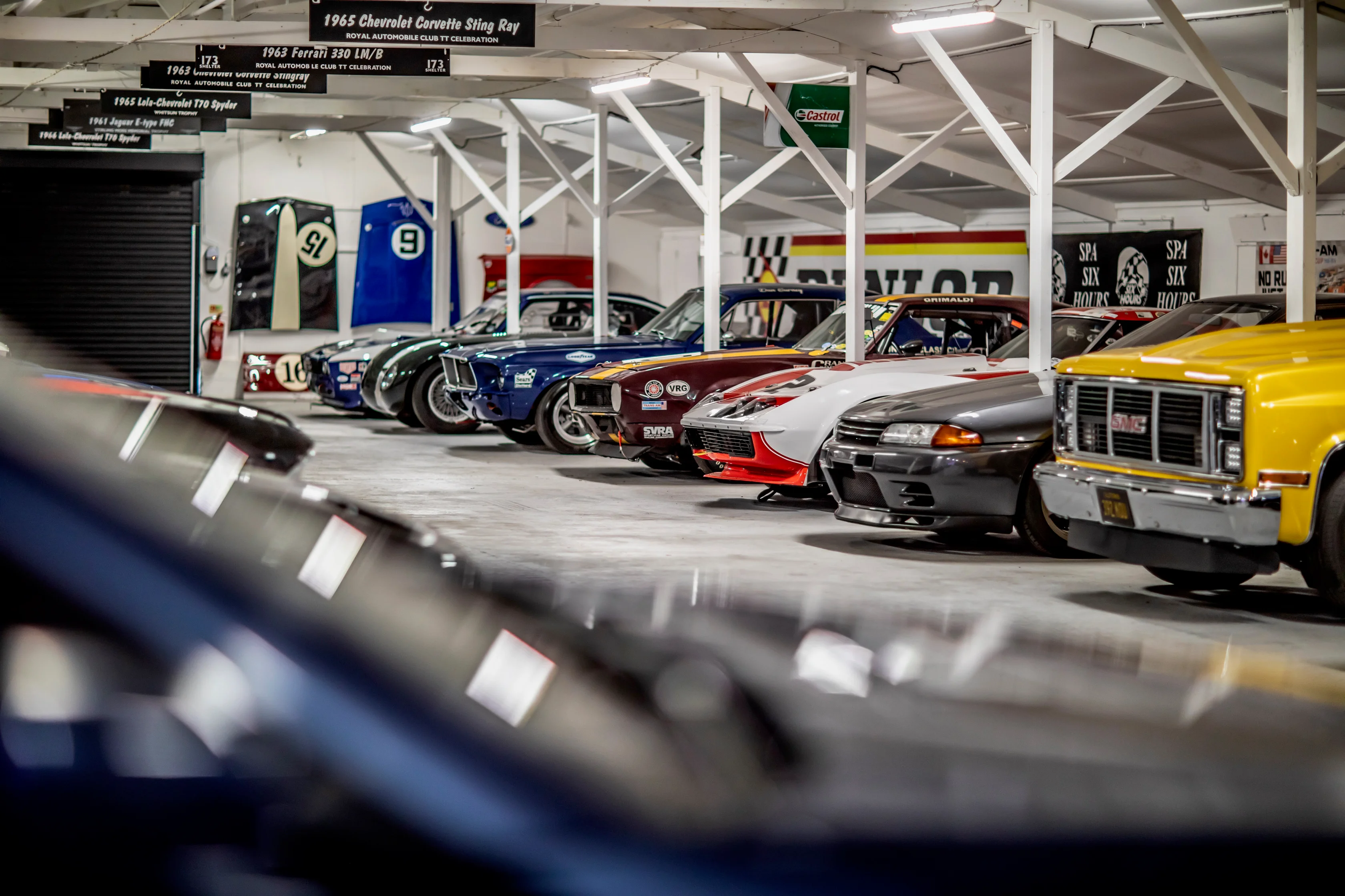 Race cars and classics inside the Paddock Club workshop